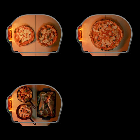 Blick von oben auf drei kleine Pizzaöfen - darunter ein Gozney Dome Gen 2 Pizzaofen von Gozney mit Hybrid Brennstoffsystem. Zwei Öfen backen Pizza, während der dritte in dieser Outdoor-Küche gebratenes Gemüse, Garnelen aus der Pfanne und Fisch mit Zitrone zubereitet.