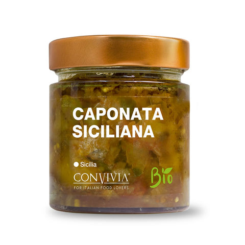 Un bocal de caponata sicilienne bio de la marque Convivia avec un couvercle doré. L'étiquette souligne l'utilisation d'ingrédients biologiques, ce qui le rend idéal pour les amateurs de cuisine italienne. À l'intérieur, vous trouverez un plat traditionnel d'aubergines siciliennes qui capture les saveurs authentiques de la Sicile.