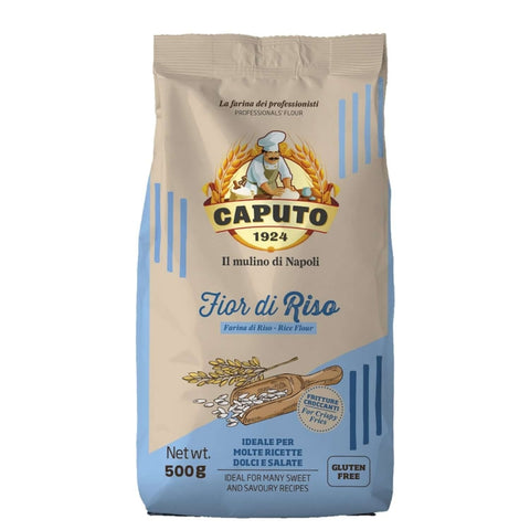 Eine 500g-Tüte Mulino Caputo Fior di Riso (Reismehl) in Beige und Blau mit dem Text „Fior di Riso“ und „Il mulino di Napoli“ auf der Vorderseite. Die Tüte zeigt einen Mann, der Weizen hält, und ist als glutenfrei gekennzeichnet. Ideal für viele süße und herzhafte Backrezepte.