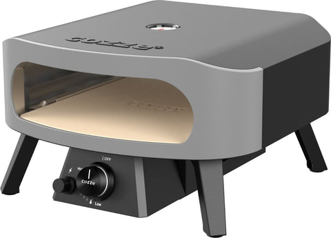 Der Cozze 13 Zoll Pizzaofen CLASSIC, Gas 50mbar - CH-Regler hat ein graues Äußeres, schwarze Beine, Glasfrontfenster, Temperaturregler und Cordierit-Pizzastein. Der Markenname "Cozze" ist auf der Oberseite und im Inneren angebracht.