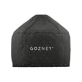 Die Gozney Dome Abdeckhaube Off-Black von Gozney ist eine schwarze, wetterfeste Hülle mit einem dezenten Kreuzmuster und dem Schriftzug "GOZNEY" in fetten weißen Lettern auf der Vorderseite, die vor einem weißen Hintergrund steht.